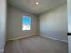 Bedroom featuring carpeted floors and natural light from one window at 804 Hillfarm Dr, Wake Forest, NC 27587