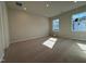 Large bedroom with carpet, recessed lighting, and lots of natural light from two windows at 804 Hillfarm Dr, Wake Forest, NC 27587