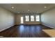 Spacious living room with dark wood flooring and an abundance of natural light at 804 Hillfarm Dr, Wake Forest, NC 27587