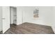 Bedroom with new floors, closet, and window offering storage and natural light at 824 S Tillery St, Rocky Mount, NC 27803