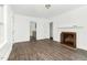 Spacious living room featuring refinished floors, and access to the kitchen, ready for move in at 824 S Tillery St, Rocky Mount, NC 27803