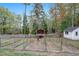 A vegetable garden sits in the backyard, along with a storage shed and bird house at 928 Magnolia Ridge Way, Fuquay Varina, NC 27526