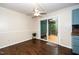 Bright dining area with sliding glass doors leading to outdoor deck at 928 Magnolia Ridge Way, Fuquay Varina, NC 27526