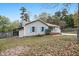 Charming single-story home with blue shutters, flower beds, and a well-manicured lawn at 928 Magnolia Ridge Way, Fuquay Varina, NC 27526