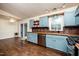 Open-concept kitchen area adjacent to dining, featuring modern appliances at 928 Magnolia Ridge Way, Fuquay Varina, NC 27526
