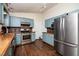 Spacious kitchen with stainless steel appliances and lots of cabinet storage at 928 Magnolia Ridge Way, Fuquay Varina, NC 27526