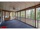 Spacious screened porch with wood trim, ceiling fan, and views of the backyard at 928 Magnolia Ridge Way, Fuquay Varina, NC 27526