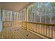 Back porch with natural wood and railings, overlooks wooded area at 0 Jasmine Rd, Fuquay Varina, NC 27526