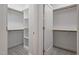 Spacious walk-in closet features built-in shelving and ample storage space for organization at 0 Jasmine Rd, Fuquay Varina, NC 27526