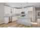 A new kitchen features stainless appliances, granite countertop and white cabinets at 0 Jasmine Rd, Fuquay Varina, NC 27526