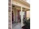Inviting front porch featuring stone accents, a cozy seating area, and a well-maintained entrance at 78 Florence Dr, Clayton, NC 27527