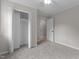 Cozy bedroom featuring new carpet and a spacious closet, perfect for storage at 100 Royall Rd, Oxford, NC 27565