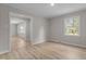 Bedroom with light colored walls and wood flooring at 100 Royall Rd, Oxford, NC 27565