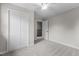 Neutral bedroom featuring a ceiling fan, carpet, and closet with bi-fold doors at 100 Royall Rd, Oxford, NC 27565