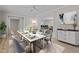 Bright dining room with a marble dining table set for a meal at 100 Royall Rd, Oxford, NC 27565
