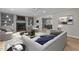 Living room featuring a marble fireplace, built-in shelving, and stylish modern furniture at 100 Royall Rd, Oxford, NC 27565
