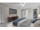 Main bedroom showcasing carpeted floors, TV, and ensuite bathroom at 100 Royall Rd, Oxford, NC 27565