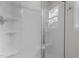 Clean, modern shower with glass doors and chrome fixtures at 100 Royall Rd, Oxford, NC 27565