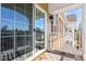 Relaxing balcony with tile floors and sliding glass doors to allow fresh air inside at 10210 Sablewood Drive # 112, Raleigh, NC 27617