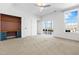 Expansive bedroom featuring a built-in desk area, natural light, and access to a private balcony at 10210 Sablewood Drive # 112, Raleigh, NC 27617