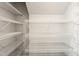 Walk-in pantry with multiple shelves for storing all dry goods and kitchen supplies at 10210 Sablewood Drive # 112, Raleigh, NC 27617