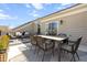 Outdoor patio with a large dining table, ample seating, and views of the community at 10210 Sablewood Drive # 112, Raleigh, NC 27617