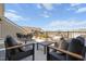 Expansive outdoor patio with comfortable seating and a dining table overlooking the community at 10210 Sablewood Drive # 112, Raleigh, NC 27617