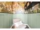 Cozy room with accent chair and custom wall decor creating a pleasant atmosphere at 10210 Sablewood Drive # 112, Raleigh, NC 27617