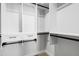 This walk-in closet has shelves and drawers for ample storage at 10210 Sablewood Drive # 112, Raleigh, NC 27617