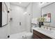 Sleek bathroom featuring a glass-enclosed shower with marble tile, and a modern vanity at 1028 Zelkova Ln, Chapel Hill, NC 27517