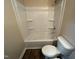 Bathroom featuring a combined tub and shower with white tiling at 103 Beam Cir, Louisburg, NC 27549