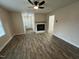 Spacious living room with a brick fireplace at 103 Beam Cir, Louisburg, NC 27549