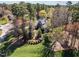 A large house with a well-manicured lawn and mature trees at 10540 Byrum Woods Dr, Raleigh, NC 27613