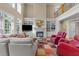 Spacious living room with fireplace, built-in shelving, and comfortable seating at 10540 Byrum Woods Dr, Raleigh, NC 27613