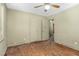 Bedroom with hardwood floors and a doorway to the hallway at 1101 Nashville Rd, Rocky Mount, NC 27803
