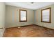 Bedroom with two windows providing natural light at 1101 Nashville Rd, Rocky Mount, NC 27803
