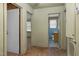 Hallway view showing doorways to other rooms, including one to the bathroom at 1101 Nashville Rd, Rocky Mount, NC 27803