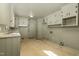 Spacious kitchen with ample cabinet space, laminate counters, and door to the outside at 1101 Nashville Rd, Rocky Mount, NC 27803