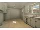 Functional kitchen with ample storage, laminate countertop space, and lots of natural light at 1101 Nashville Rd, Rocky Mount, NC 27803