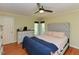 Bedroom featuring hardwood floors, a ceiling fan and neutral-toned walls at 114 Twin Springs Ln, Angier, NC 27501