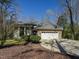 Charming home featuring a brick facade, a two-car garage and a well-manicured lawn at 114 Twin Springs Ln, Angier, NC 27501