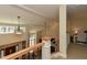 Staircase overlooks a fireplace, sitting area, and study at 114 Twin Springs Ln, Angier, NC 27501