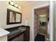 Wet bar featuring a sink and beverage refrigerator, located near a bedroom at 114 Twin Springs Ln, Angier, NC 27501