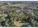 Aerial view of a wooded property with highlighted boundary lines in a rural area at 1301 Flying Hawk Rd, Apex, NC 27523