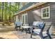 Cozy backyard patio with stylish outdoor furniture, ideal for relaxing and enjoying the scenery at 1301 Flying Hawk Rd, Apex, NC 27523