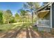 Picturesque backyard view featuring a well-manicured lawn and inviting outdoor space at 1301 Flying Hawk Rd, Apex, NC 27523