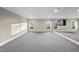 Bright exercise room featuring large mirrors, ample natural light, and space for fitness equipment and activities at 1404 Barony Lake Way, Raleigh, NC 27614