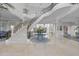 Elegant foyer with a sweeping staircase, marble floors, and views into the dining and living areas at 1404 Barony Lake Way, Raleigh, NC 27614