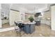 Spacious kitchen with granite countertops, two kitchen islands and tile floors at 1404 Barony Lake Way, Raleigh, NC 27614