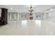 Bright and spacious recreation room with a fireplace, tile floors, and a bar perfect for relaxation and entertainment at 1404 Barony Lake Way, Raleigh, NC 27614